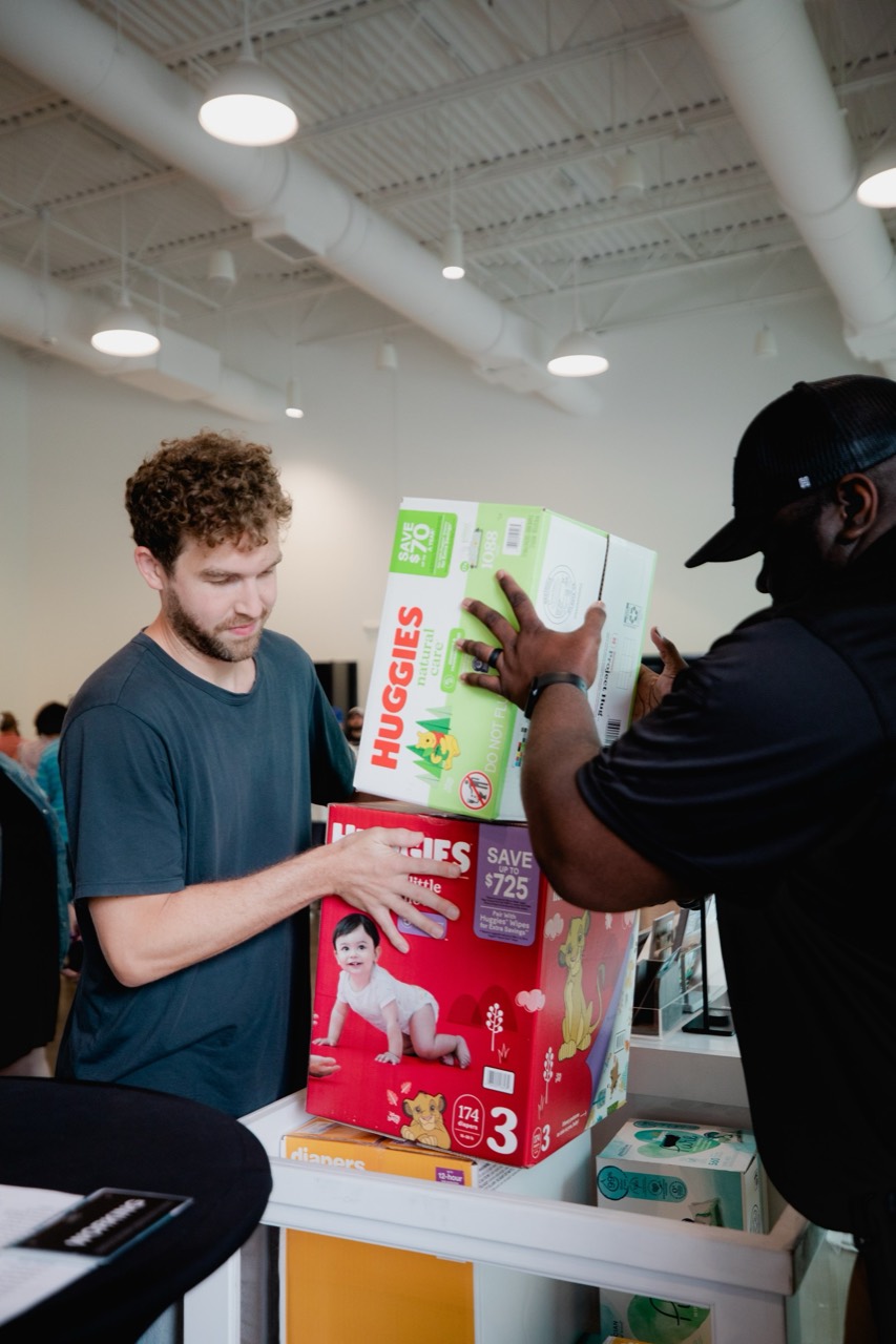 Outreach volunteers organizing donated supplies